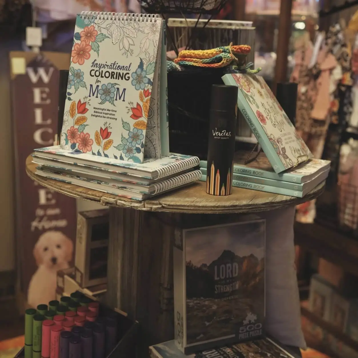 Adult coloring books on boutique table